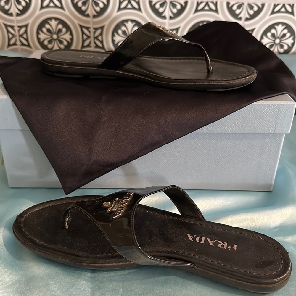 Prada black patent flip flops